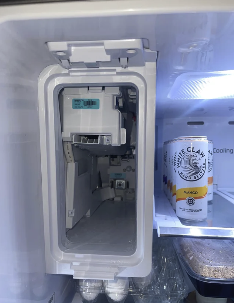Samsung refrigerator ice maker compartment opened during a defrost and compressor service on Long Island
